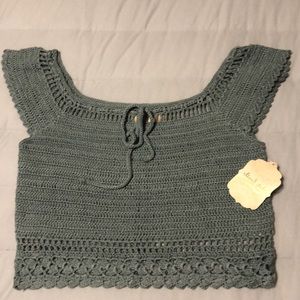 Small dusty blue cropped shirt from Altar’d State